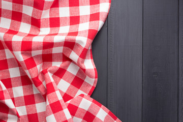 cloth napkin or  tablecloth checked at wooden plank board table
