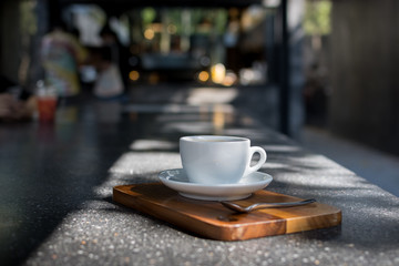 Coffee Cup on table Cafe shop Interior with Blur background