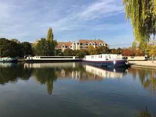 The Canal Port in Dijon is an old river harbor on the Burgundy Canal, a canal in central eastern France.