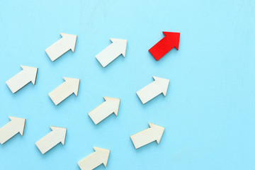 Business leadership concept, red arrow leader with group of followers