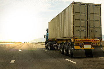 Cargo Truck on highway road with container, transportation concept.,import,export logistic industrial Transporting Land transport on the expressway against sunrise sky