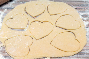 Hearts shape cookies cooking process. Valentines day gift preparation dating.