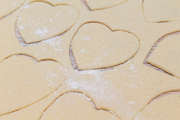 Hearts shape cookies cooking process. Valentines day gift preparation dating.