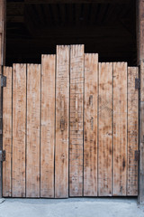 Wooden gate doors. Background with rough texture.