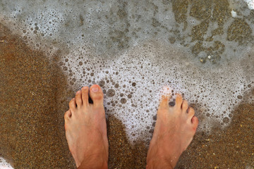 feet on the beach