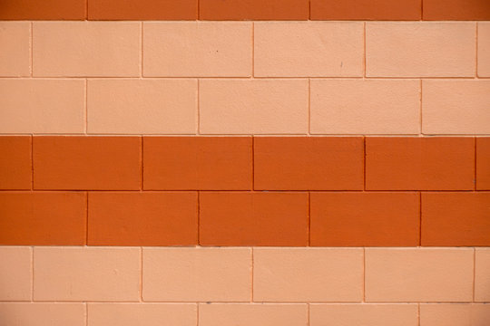Two tone color of orange brick wall for background. © samrit