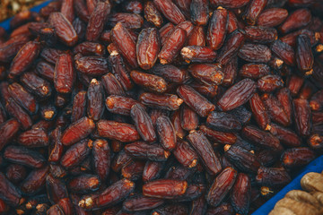 Close up dates background. Selling dates in the local market or harvest