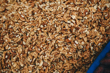 Close up walnuts background. Selling nuts in the local market or harvest