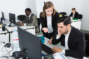 Young woman expressing dissatisfaction with work