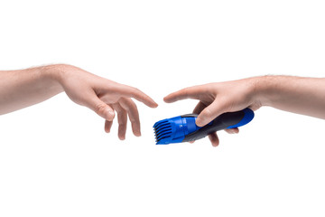 Two male hands passing one another trimmer on white background