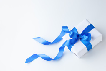 ribbon with blue bow isolated on white