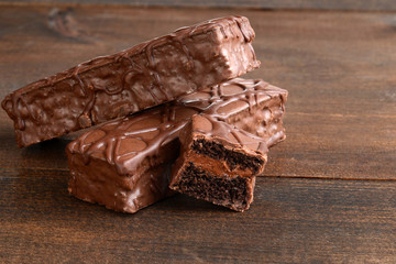 three chocolate cream filled cake bars