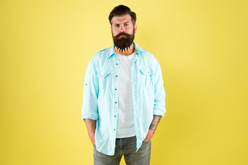 man clothespin on beard. brutal male put clothespin with hearts on beard. bearded man hipster casual style. valentines day. love care my beard hair. laundry. hair drying. barbershop