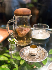 Herbal Green Tea serving, with Japanese table setting and flowers
