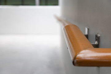 Fototapeta premium wooden handrail for support wheelchair disabled and ramp way background.