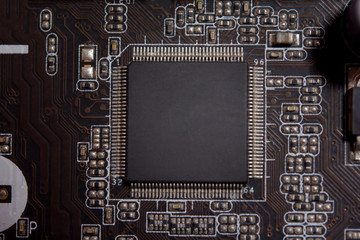 Close up blank microchip on Electronic circuit board..