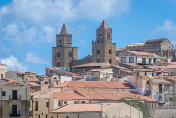 Fototapeta na wymiar Tower of cathedral on the Old Town of Cefalu city located on the Tyrrhenian Sea on Sicily Island in Italy
