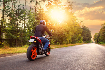 driving a motorcycle on a sunny day