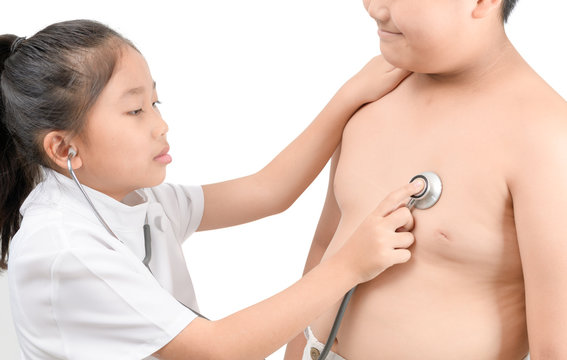 Little doctor check heart by stethoscope to obese boy - Powered by Adobe