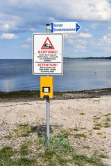 Warnschild am Strand
