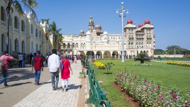 India, Karnataka, Mysore, City Palace, people walking outside the Maharaja's Palace - time lapse