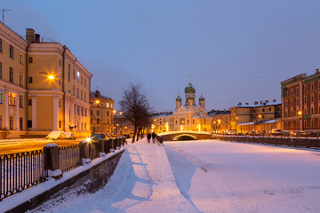 Fototapeta na wymiar St Isidore's Church in St. Petersburg, Russia. Griboedov night channel, winter, snow.