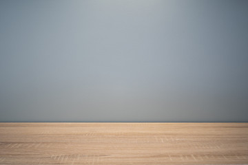 empty wooden table and wall