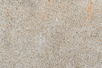 The texture of the old concrete wall with scratches, cracks, dust, crevices, roughness, stucco. Can be used as a poster or background for design. Copy space for text message.