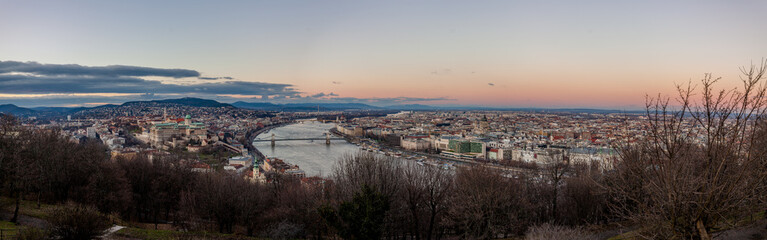 Aerial panoramic view Budapest, Hungary by sunset. Buda castle, Chain bridge and Parliament building