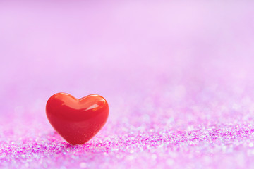 Valentines Day background with Red heart shapes on abstract light pink glitter background, Copy space