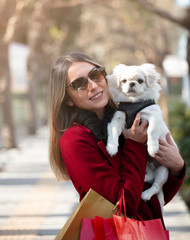 pretty young woman with her cute little dog