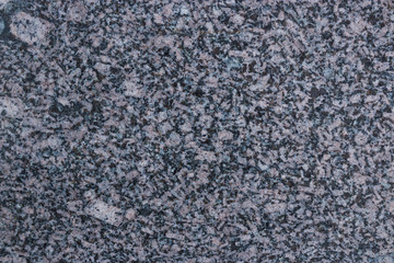 Structure of natural stones close-up. The stones are piled high.