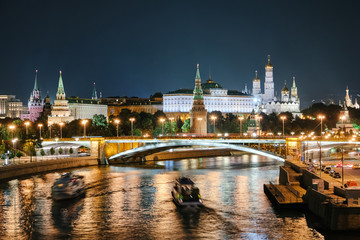 Fototapeta na wymiar Kremlin view from Patriarshii bridge at winter night in Moscow, Russia.