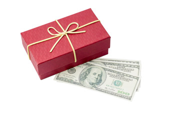 Red gift box and 100 US Dollars isolated on a white background. Isolated on white with clipping path.