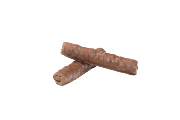 two chocolate tubules on a white isolated background