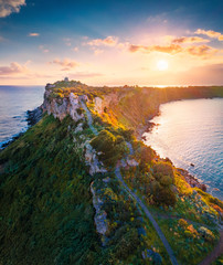 View from flying drone. Aerial spring view of Milazzo lighthouse. Gorgeous morning scene of Milazzo...