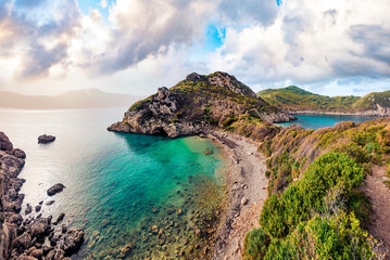 Beautiful spring scene of Pirates Bay, Porto Timoni, Afionas village location. Perfect morning seascape of Ionian Sea. Fantastic outdoor scene of Corfu island, Greece, Europe.