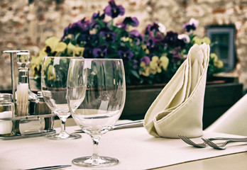 Serving tables in the  outdoor restaurant