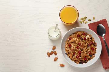 Tasty healthy breakfast served on white wooden table, flat lay. Space for text