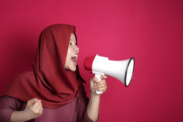 Young Businesswoman Angry, Screaming With Megaphone