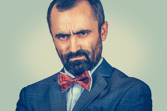 angry man looking accusatory to you camera