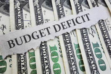 Budget Deficit news headline on money - obrazy, fototapety, plakaty
