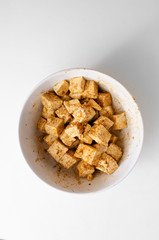 TOFU IN WHITE BOWL