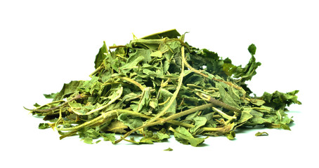 Heap of dried mint leaves isolated on white background. Close-up.