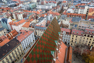 Tiled roof of St Elisabeth basilica seen from a viewing tower in historic part of Wroclaw city, Poland