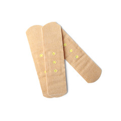 Medical sticking plasters isolated on white. First aid item