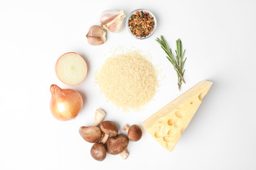 Different ingredients on white background, top view. Risotto recipe