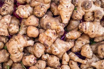 A pile of very delicious exotic vegetables, sunroot in a grocery.