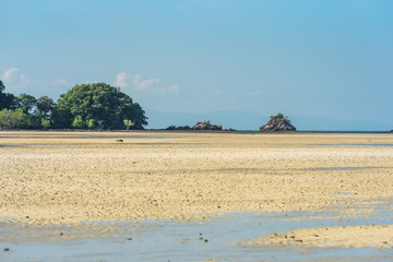 Fototapeta na wymiar Low tide in the buffalo bay, in Thai called Ao Khao Kwai, a beautiful beach on the island of Ko Phayam in Thailand