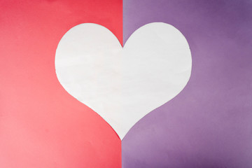 Flat lay of a hole in cardboard shaped heart